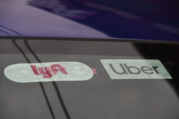 A California judge ruled Uber and Lyft must classify drivers as employees.  Photo by Robyn Beck / AFP via Getty Images.