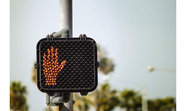 Crosswalk sign in stop mode