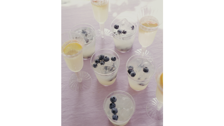 Lemonade with blueberries & Prosecco with peaches.