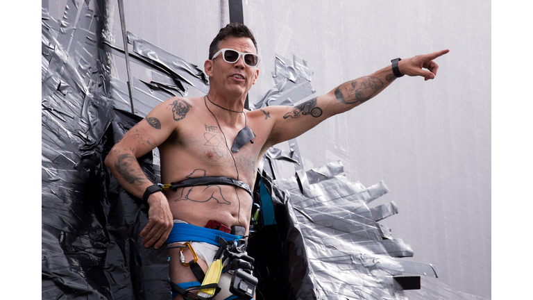 Steve-O Duct-Tapes Himself To Billboard In Promotion Of His New Special "Gnarly"