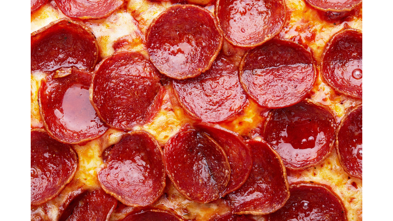 Closeup of Pepperoni pizza as a background