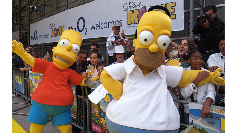 Mascots dressed as Homer Simpson (R) and