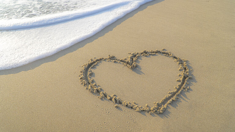 High Angle View Of Heart Shape On Sand