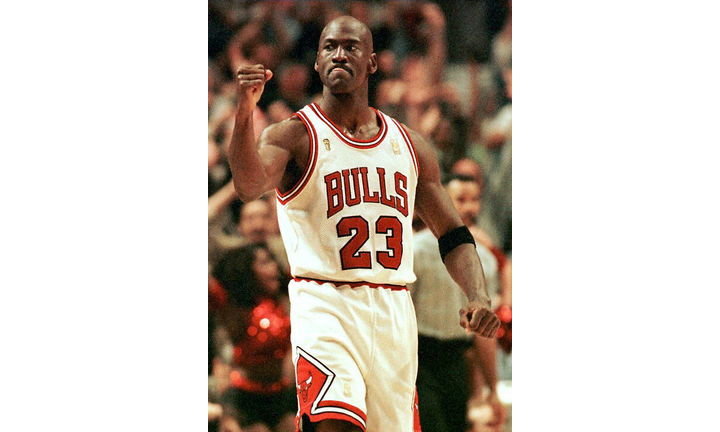 Michael Jordan of the Chicago Bulls pumps his fist