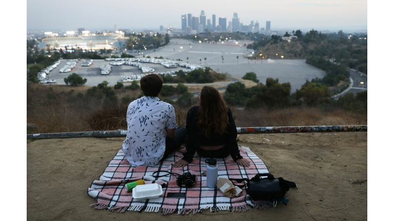 People Gather on Hillside Overlooking Game at Dodger Stadium