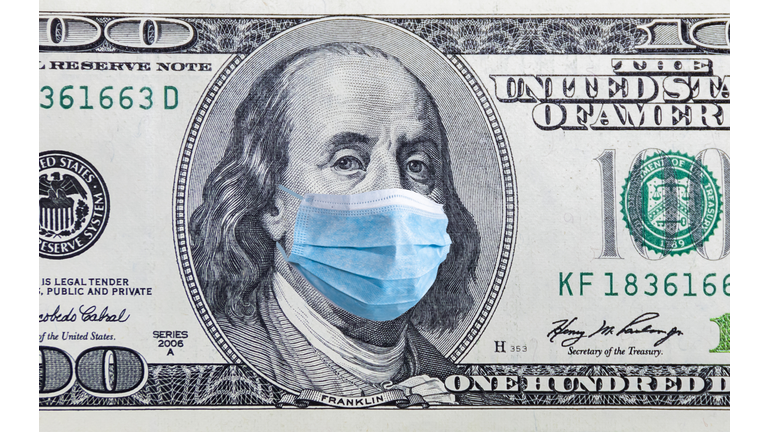 US quarantine, 100 dollar banknote with medical mask. The concept of epidemic and protection against coronavrius.