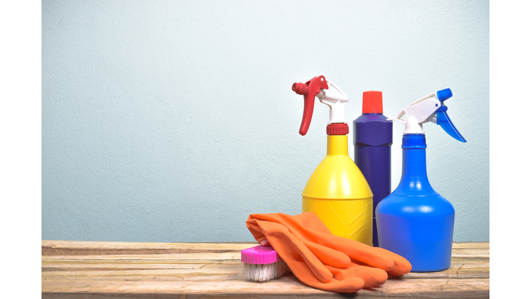 Cleaning Products On Tablet Against Gray Colored Wall