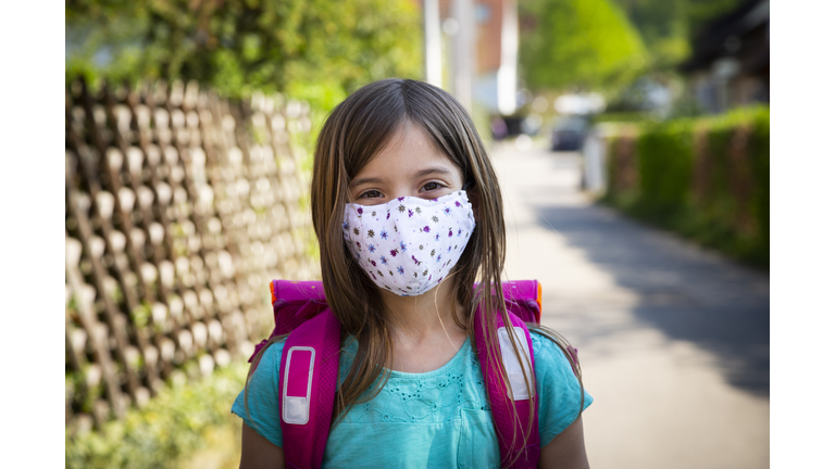 Little girl wearing self-made mask