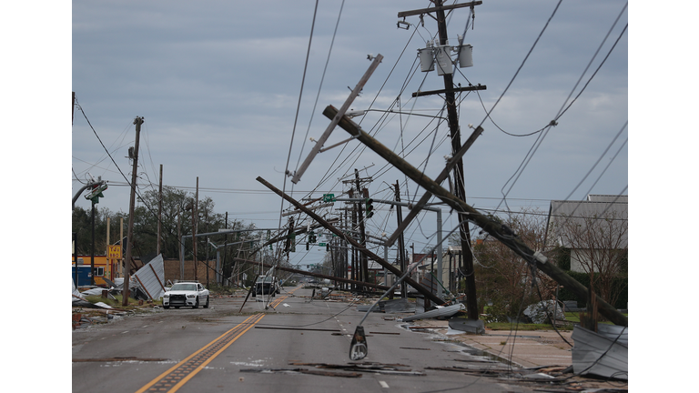 A street is seen strewn with debris and downed power lines after Hurricane Laura passed through the area on August 27, 2020 in Lake Charles, Louisiana . The hurricane hit with powerful winds causing extensive damage to the city. (Photo by Joe Raedle/Getty Images)