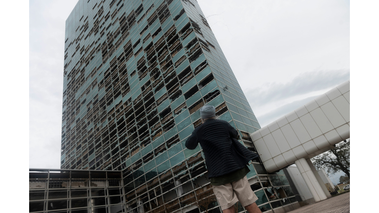 Capitol One Bank Tower is seen with its windows blown out in the downtown area after Hurricane Laura passed through on August 27, 2020 in Lake Charles, Louisiana. (Photo by Andrew Caballero-Reynolds/AFP via Getty Images)