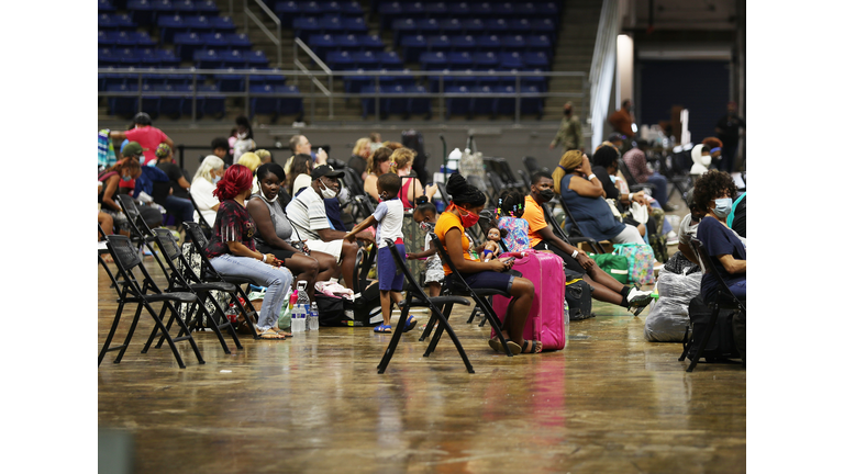  Evacuees wait to board buses as they are evacuated by local and state government officials before the arrival of Hurricane Laura on August 25, 2020 in Lake Charles, Louisiana. (Photo by Joe Raedle/Getty Images)