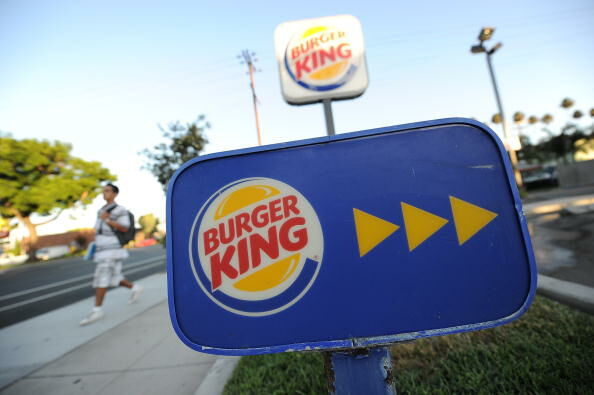A Burger King sign outside a restaurant