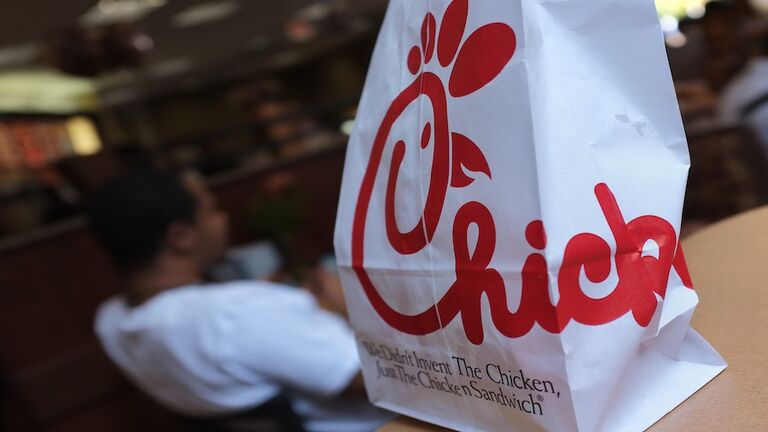 A Chick-fil-A logo is seen on a take out