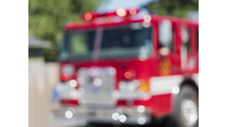 Fire Engine Cab Blurred Out of Focus Lights in Parade