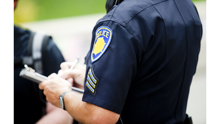 Police Writing A Ticket For Not Earing a  Seat Belt