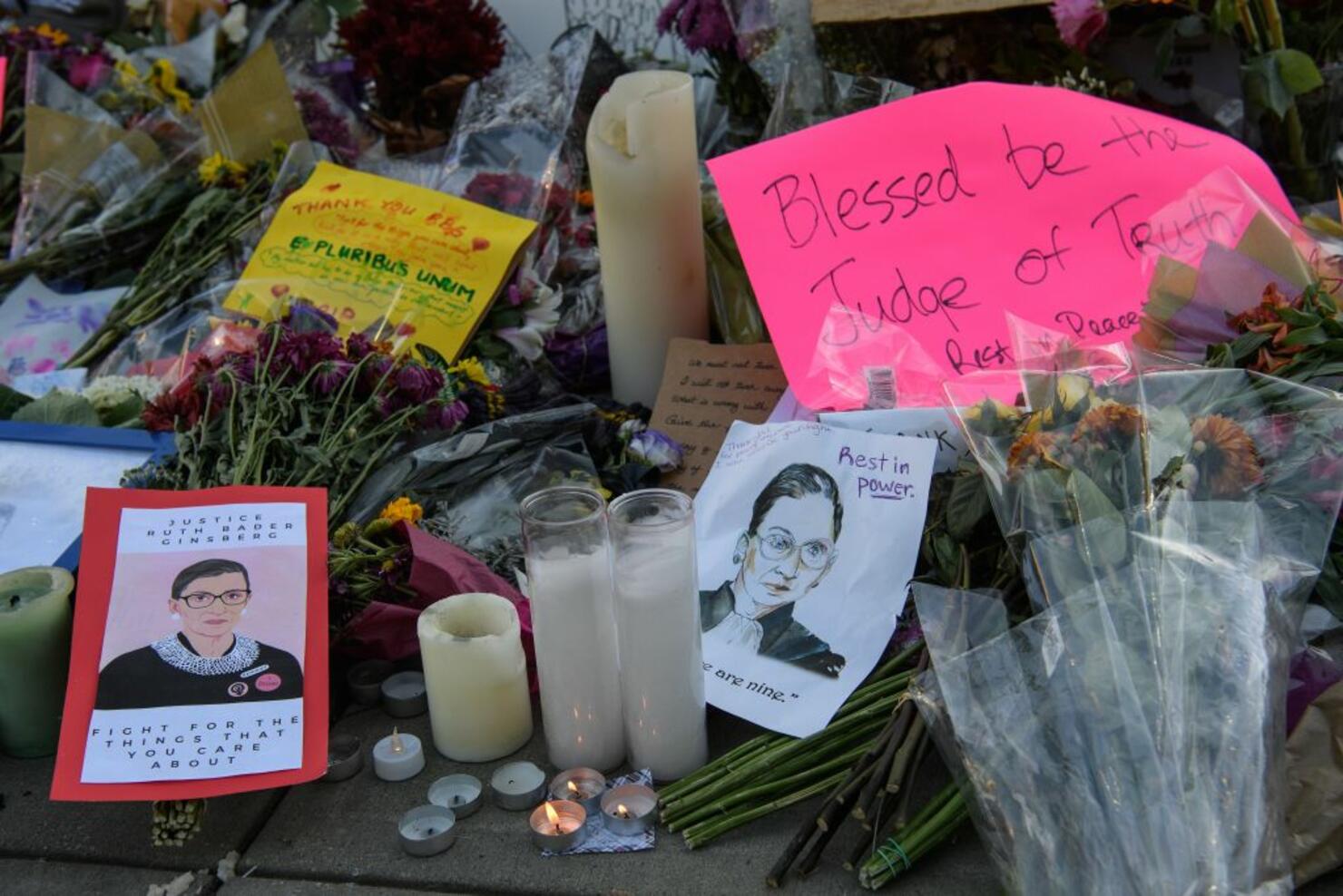 Tributes to late US Supreme Court Justice Ruth Bader Ginsburg are seen at the Supreme Court in Washington, DC