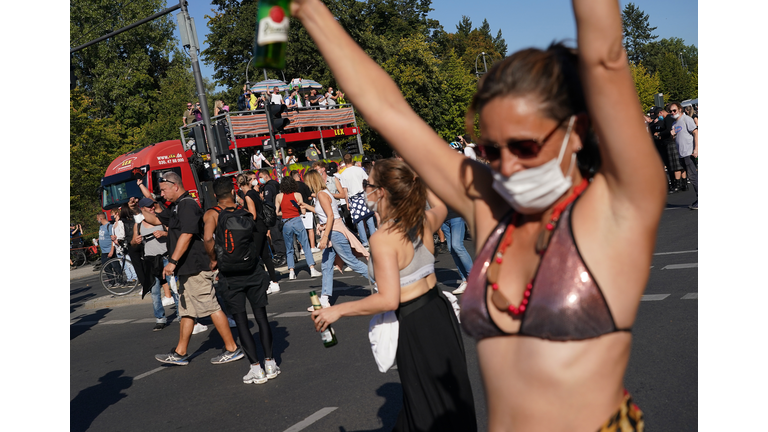 Clubbing Enthusiasts Dance In The "Love World Peace Parade" During The Coronavirus Pandemic