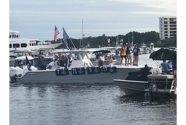 Another boat full of Tampa Bay Lightning players celebrating