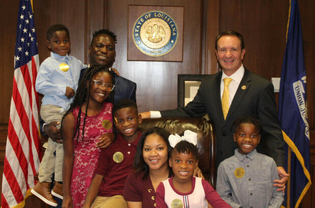 Ka'Mauri in Maroon shirt with AG Landry