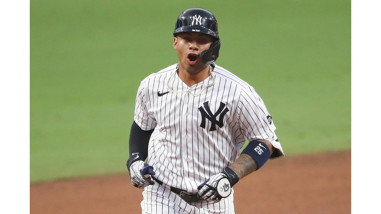 Gleyber Torres of the New York Yankees celebrates after hitting a two-run home run in the 6th inning of the Yanks' 5-1 win in Game 4