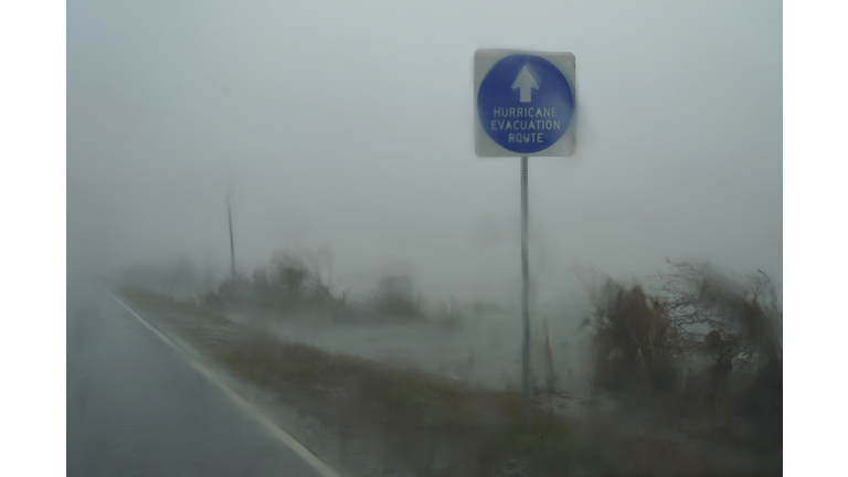 A hurricane evacuation route sign is seen as Hurricane Delta approaches on October 9, 2020 in Cameron, Louisiana. (Photo by Go Nakamura/Getty Images)