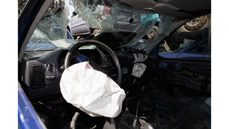 Inside of a car in a junkyard