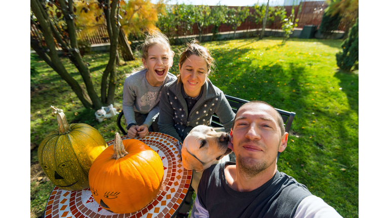 Family taking a selfie at Halloween