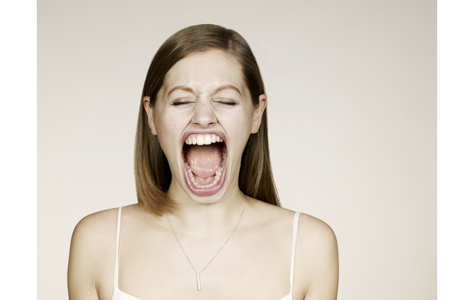 Woman shouting with big mouth