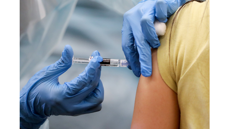 Southern California Residents Line Up For Flu Shots At Local Library