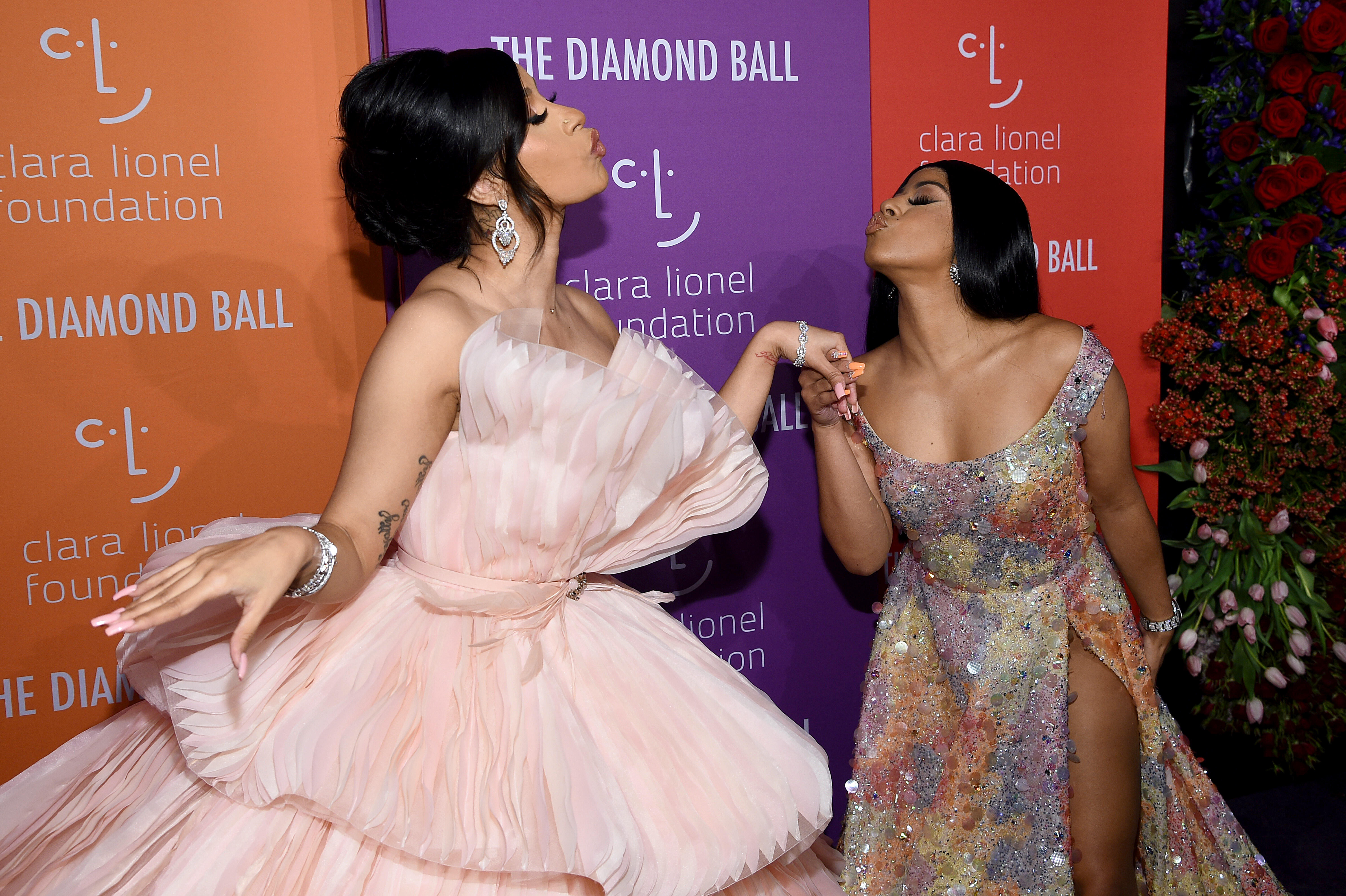 Cardi B and Hennessy Carolina Pose in Pink and Blue Chanel Leggings and  Sybgco Giant Crystal Hoops – Fashion Bomb Daily