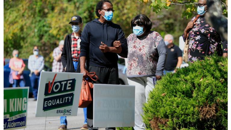 People Cast Ballots On First Day Of Early Voting In North Carolina