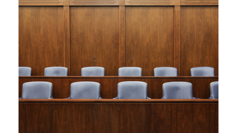 Empty chairs in jury box