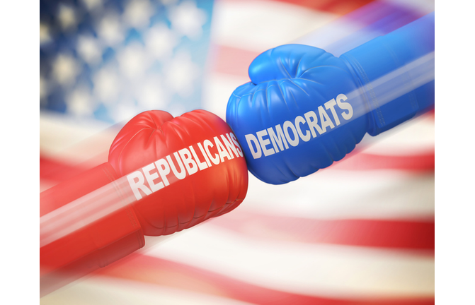 Democrats vs. Republicans. Two boxing gloves against each other in colors of Democratic and Republican party