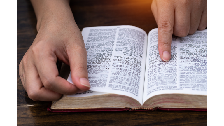 Women reading the Holy Bible.,Reading a book.