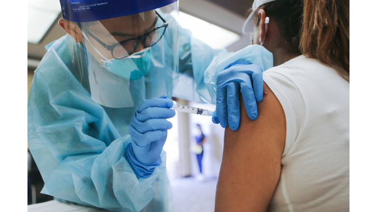 Southern California Residents Line Up For Flu Shots At Local Library