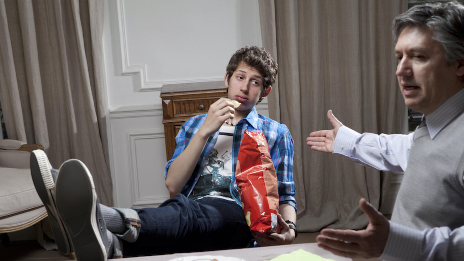 Father and son at the dinner table