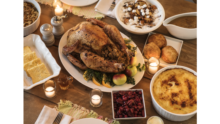 Dining table filled with thanksgiving food