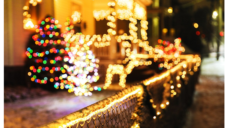 shiny Christmas decorations outside at night