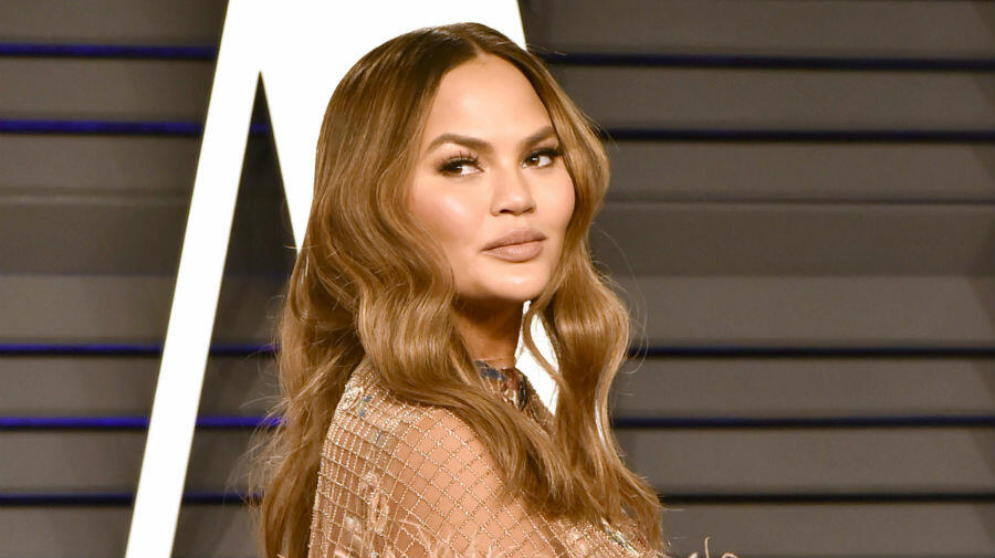 Chrissy Teigen Posts A Thirsty Topless Photo With 2 Year Old Son 