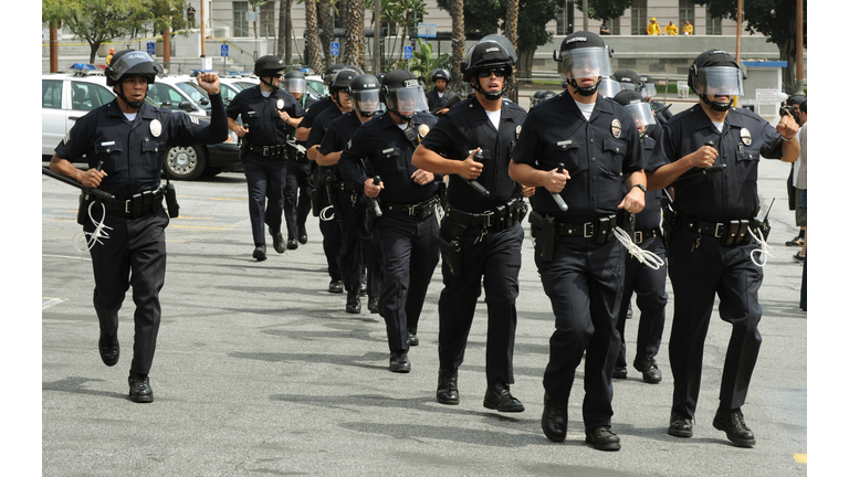 LAPD police move in to protect members o