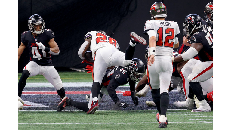 Leonard Fournette dives into the end zone to score his second touchdown against the Atlanta Falcons during the third quarter.
