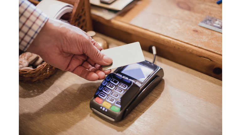 Male Using Contactless Payment