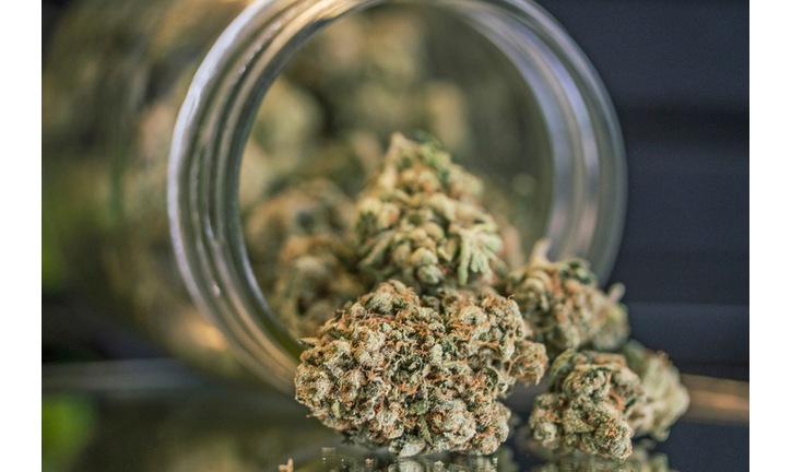 Close-Up Of Weed Porn In Mason Jar On Table