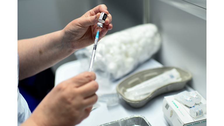 People Queue To Receive Covid Vaccines At The Louisa Jordan Hospital