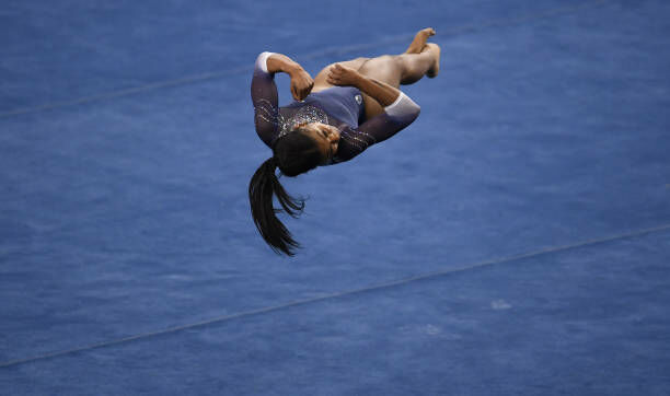 Nia Dennis is a superstar after her "Black Excellence" floor routine Saturday.