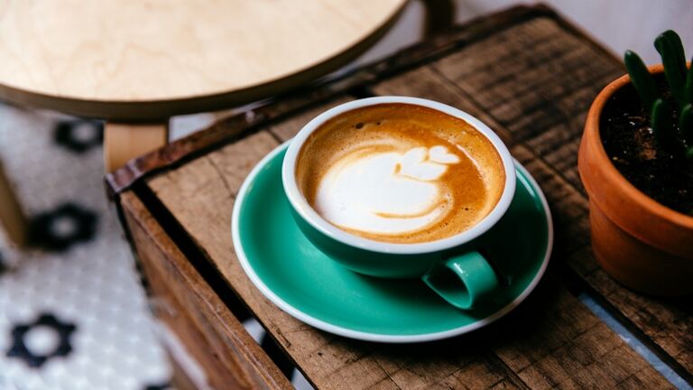 Cup of coffee on a wooden table