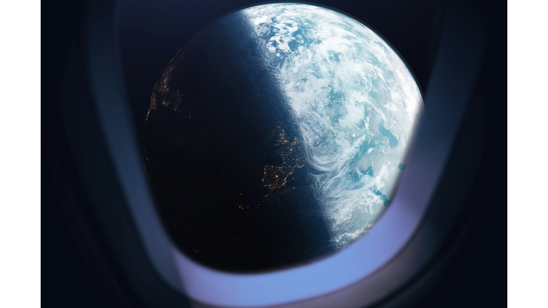 The planet earth taken from the spaceship window during outer space trip.