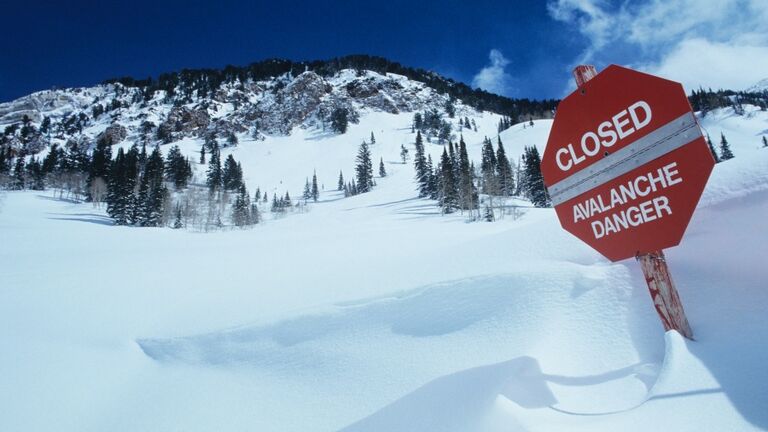 Closed Avalanche Danger Sign on Slope