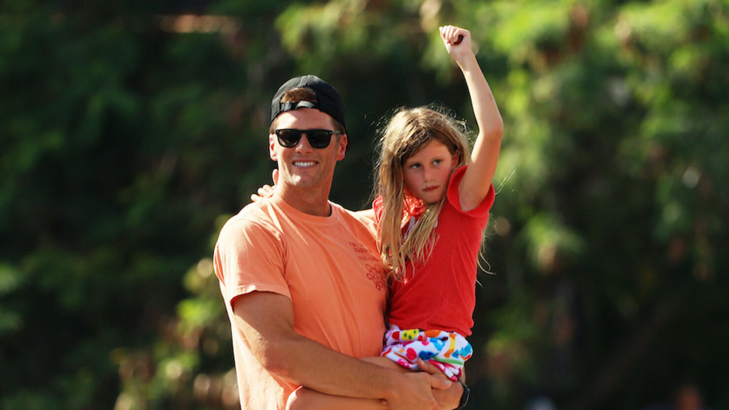 Tom Brady throws the Lombardi Trophy during Super Bowl Champion Boat Parade  