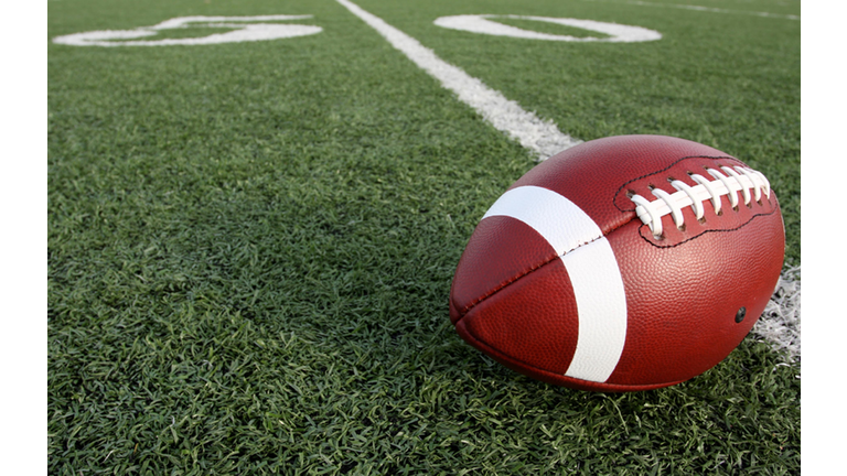 Close-Up Of American Football On Field